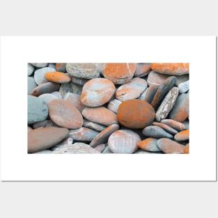 Beach stones in grey with orange coloured lichen Posters and Art